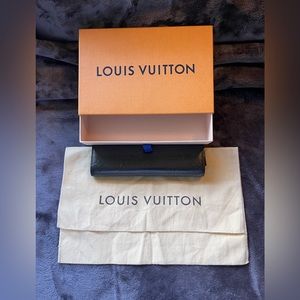 Louis Vuitton box and dust bag.